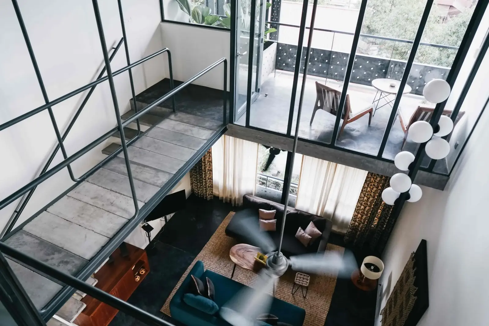 Double-height living room viewed from the floor above